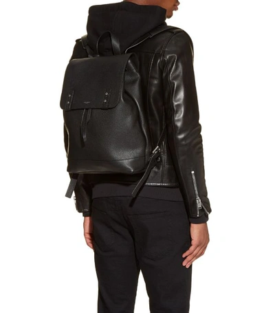 Shop Saint Laurent Leather Drawstring Backpack In Black