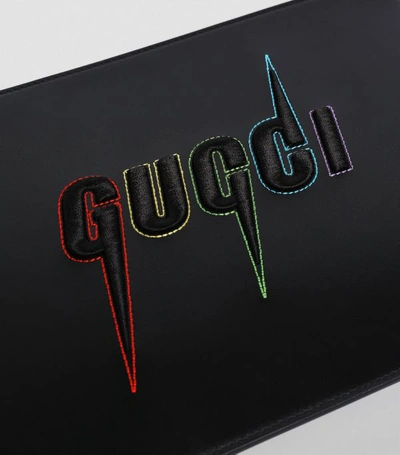 Shop Gucci Leather Embroidered Logo Pouch