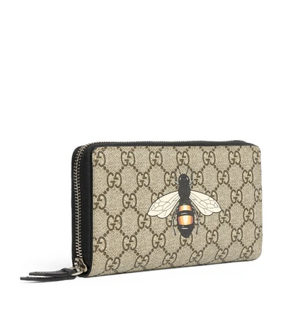 Shop Gucci Gg Supreme Bee Zip-around Wallet