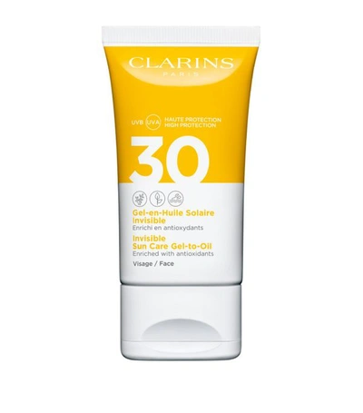 Shop Clarins Invisible Sun Care Gel-to-oil Face Spf 30 (50ml) In White