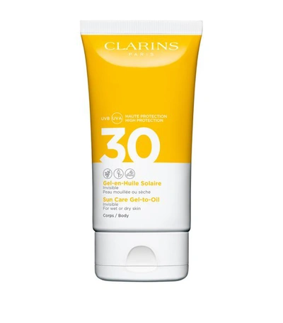 Shop Clarins Sun Care Gel-to-oil Body Spf 30 (150ml) In White