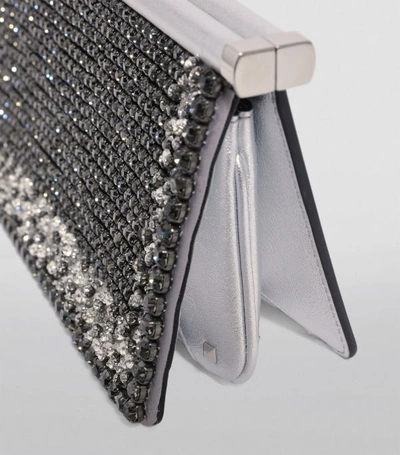 Shop Valentino Garavani Crystal-embellished Leather Clutch Bag