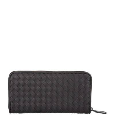 Shop Bottega Veneta Leather Intrecciato Zip-around Wallet