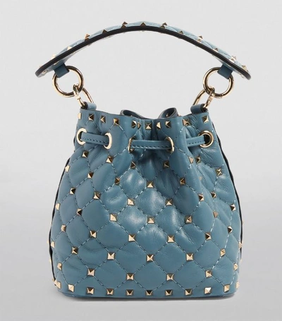 Shop Valentino Garavani Mini Rockstud Spike Bucket Bag