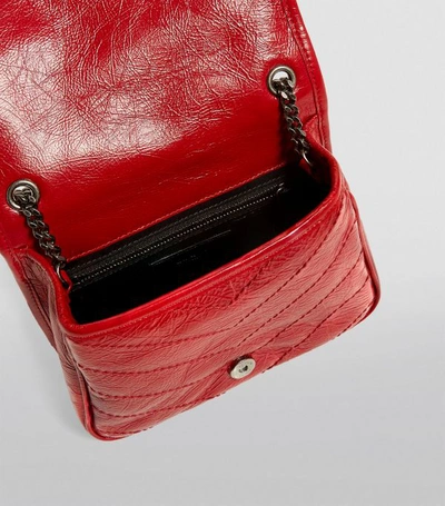 Shop Saint Laurent Small Leather Niki Chain Wallet