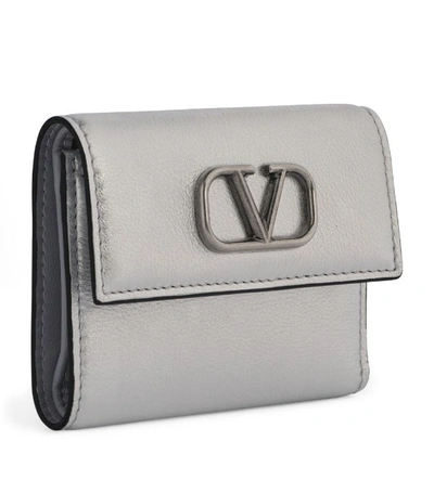 Shop Valentino Garavani Vlogo Trifold Wallet
