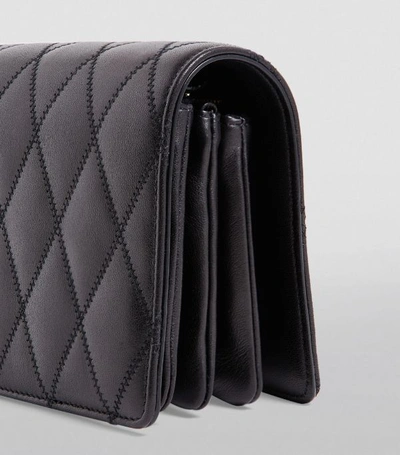 Shop Saint Laurent Quilted Leather Angie Shoulder Bag