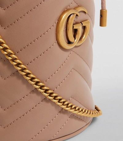 Shop Gucci Mini Leather Marmont Bucket Bag