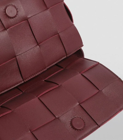 Shop Bottega Veneta Leather Cassette Cross-body Bag In Red