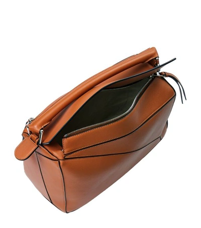 Shop Loewe Leather Puzzle Bag In Brown