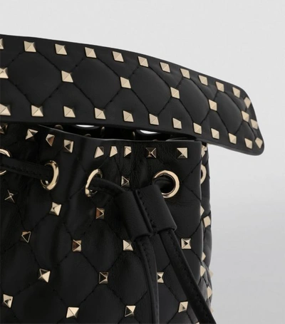 Shop Valentino Garavani Mini Rockstud Spike Bucket Bag