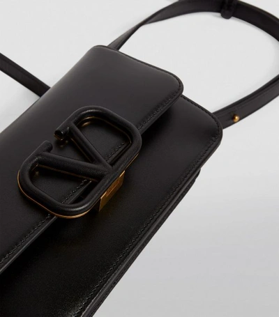 Shop Valentino Garavani Leather Vsling Belt Bag