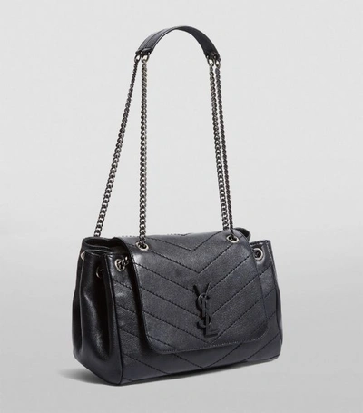 Shop Saint Laurent Medium Nolita Shoulder Bag In Black