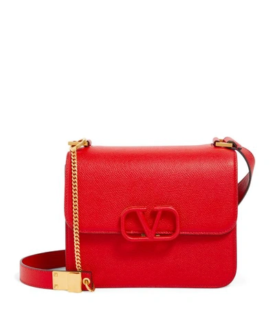 Shop Valentino Garavani Leather Vsling Shoulder Bag