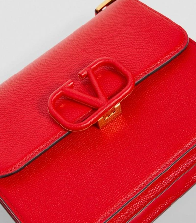 Shop Valentino Garavani Leather Vsling Shoulder Bag