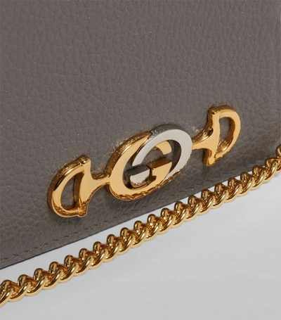 Shop Gucci Leather Zumi Chain Wallet