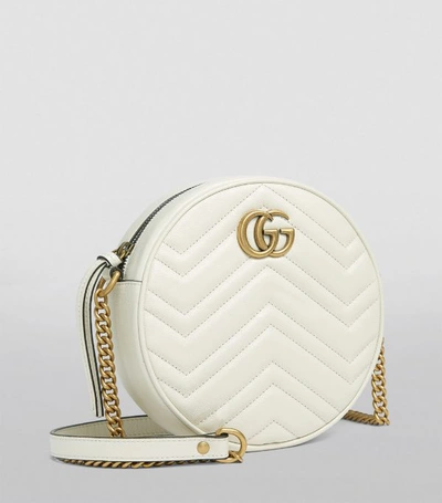 Shop Gucci Mini Round Marmont Matelassé Shoulder Bag