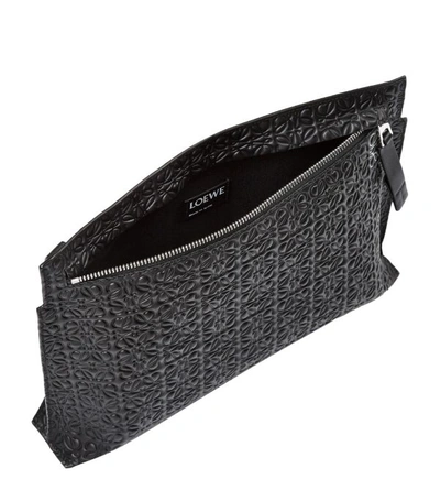 Shop Loewe Embossed Leather T Pouch