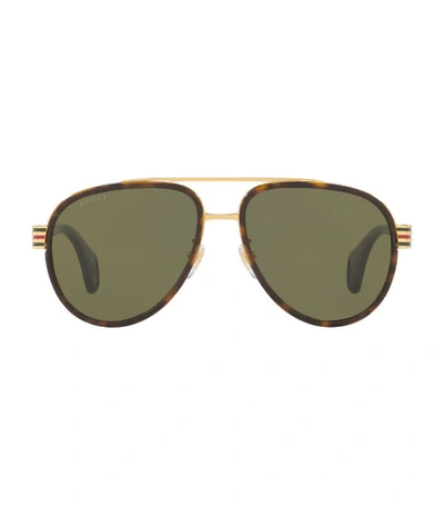 Shop Gucci Aviator Sunglasses