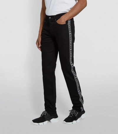 Shop Givenchy Logo Slim Jeans