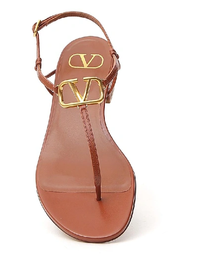 Shop Valentino Vlogo Thong Sandals In Brown