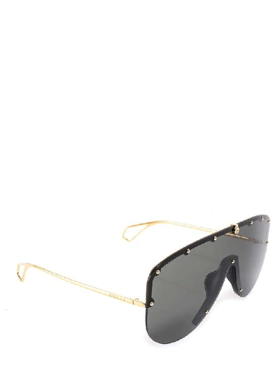 Shop Gucci Eyewear Studded Mask Frame Sunglasses In Gold