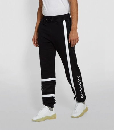 Shop Givenchy Contrast Logo Sweatpants