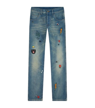 Shop Gucci Embroidered Tapered Jeans