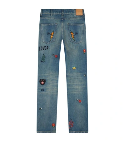 Shop Gucci Embroidered Tapered Jeans