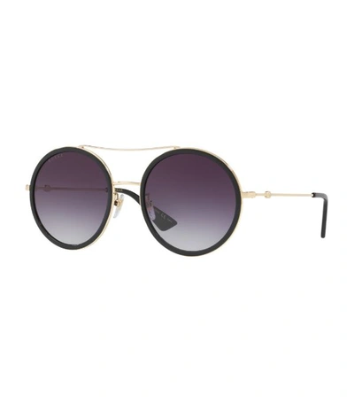 Shop Gucci Metal Round Sunglasses