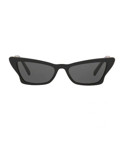 Shop Valentino Garavani Cat Eye Sunglasses In Brown