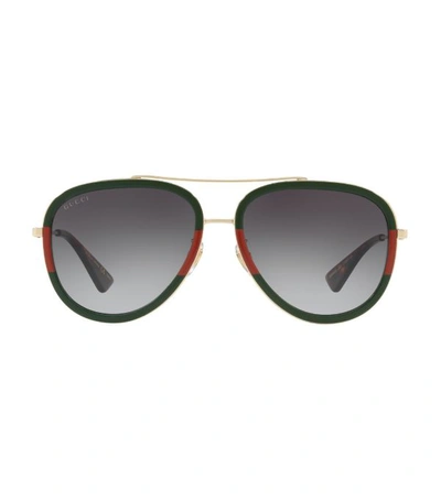 Shop Gucci Striped Aviator Sunglasses