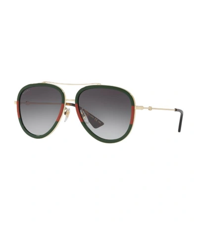 Shop Gucci Striped Aviator Sunglasses