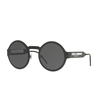 Shop Dolce & Gabbana Round Logo Sunglasses