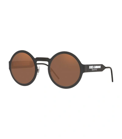 Shop Dolce & Gabbana Round Logo Sunglasses