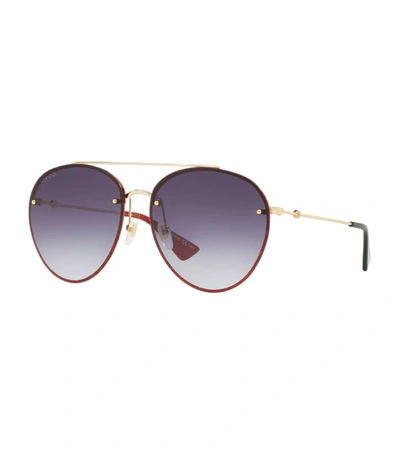 Shop Gucci Pilot Sunglasses