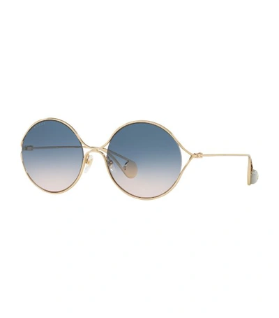 Shop Gucci Round Sunglasses