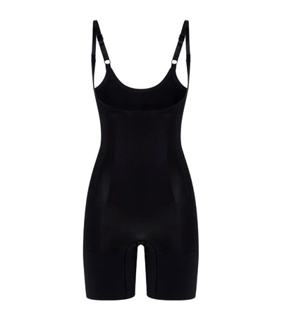 Shop Spanx Oncore Mid-thigh Bodysuit In Black