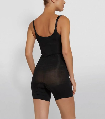 Shop Spanx Oncore Mid-thigh Bodysuit In Black