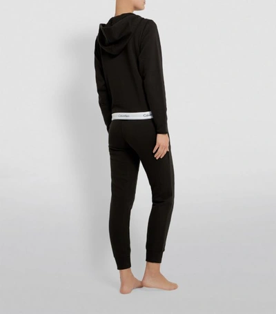 Shop Calvin Klein Logo Sleep Hoodie In Black