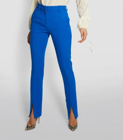 Shop Victoria Beckham Split-hem Trousers