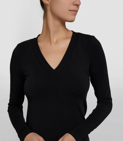 Shop Wolford Aurora Pullover Top In Black