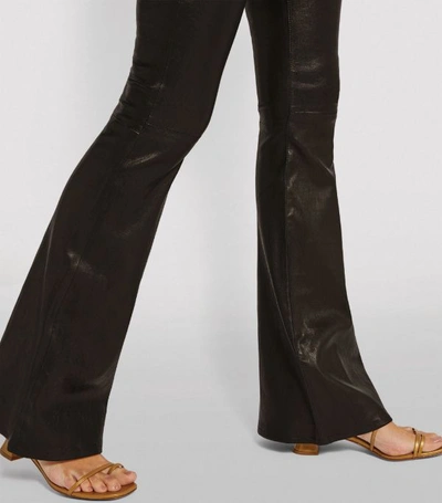 Shop Frame Le High Flared Leather Trousers