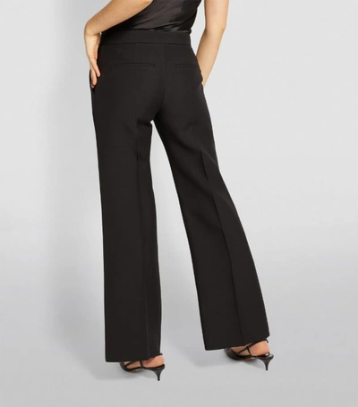 Shop Valentino Pleated Wide-leg Trousers