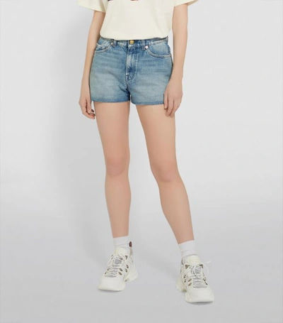 Shop Gucci Distressed Denim Shorts