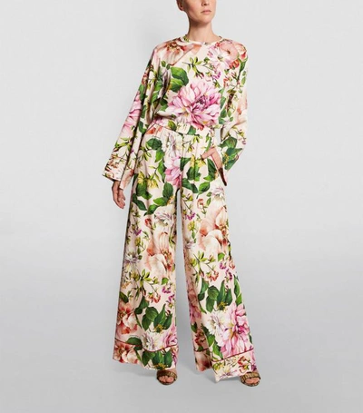 Shop Dolce & Gabbana Floral Print Trousers