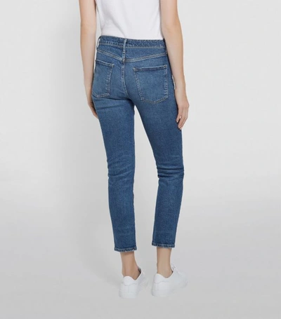 Shop Agolde Toni Mid-rise Slim Jeans
