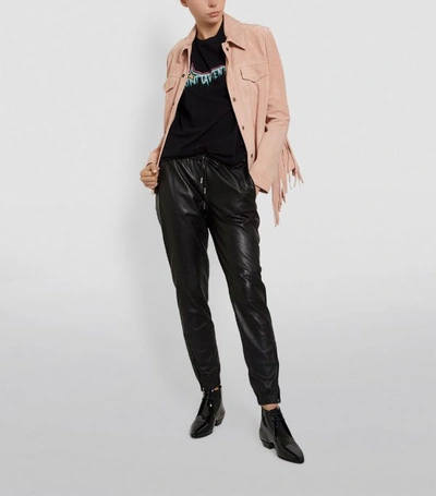 Shop Saint Laurent Leather Sweatpants
