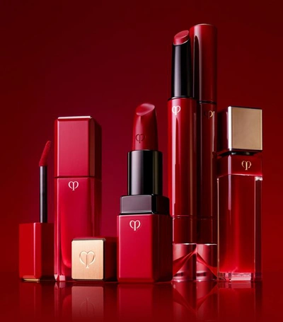 Shop Clé De Peau Beauté Radiant Lip Gloss In Red