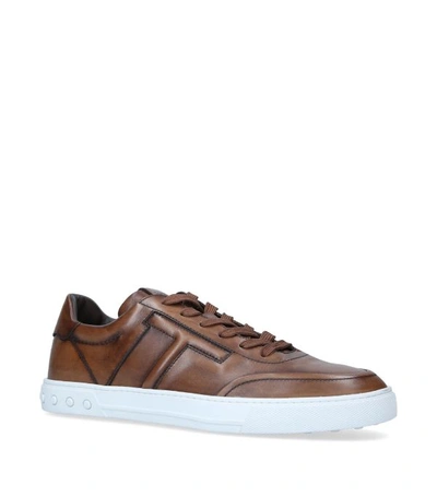 Shop Tod's Leather Cassetta T Sneakers